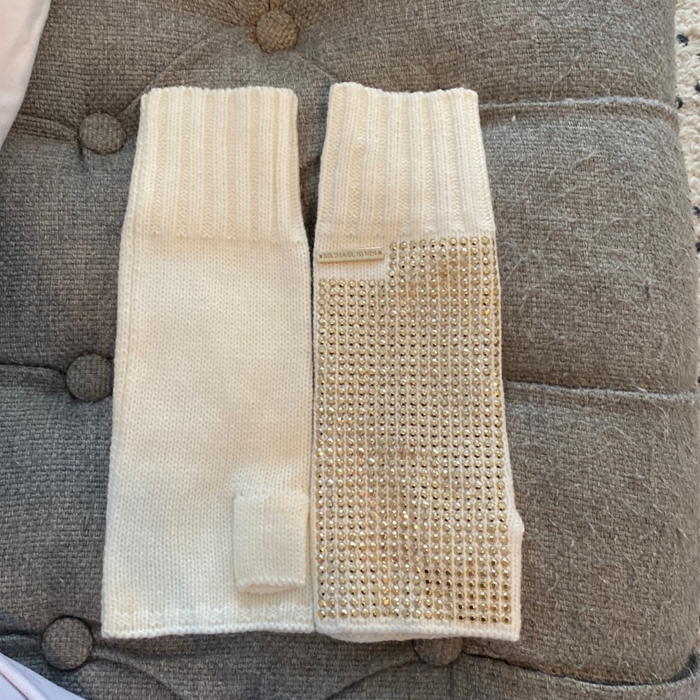 Michael Kors fingerless cream colored gloves.  In perfect condition. Never worn